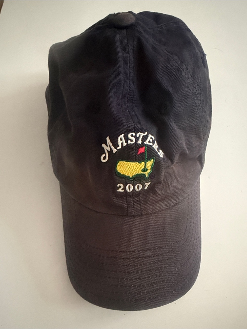 Masters Sunwashed Navy Hat with Yellow & Green Logo